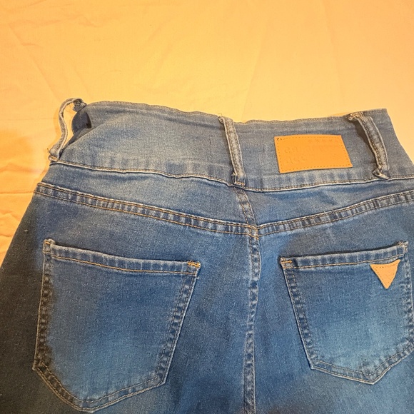 Distressed high rise skinny jeans - Picture 2 of 2